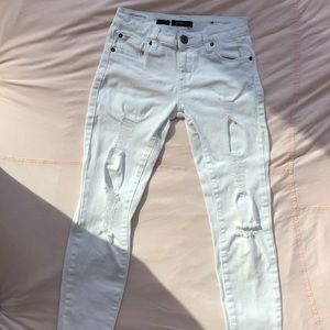 White ripped jeans